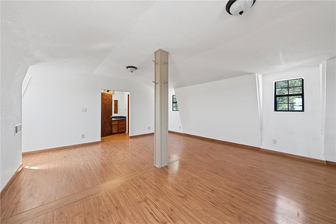 821 Old Country Road Moody, TX 76557 - Photo 10 of 21 a view of an empty room with wooden floor