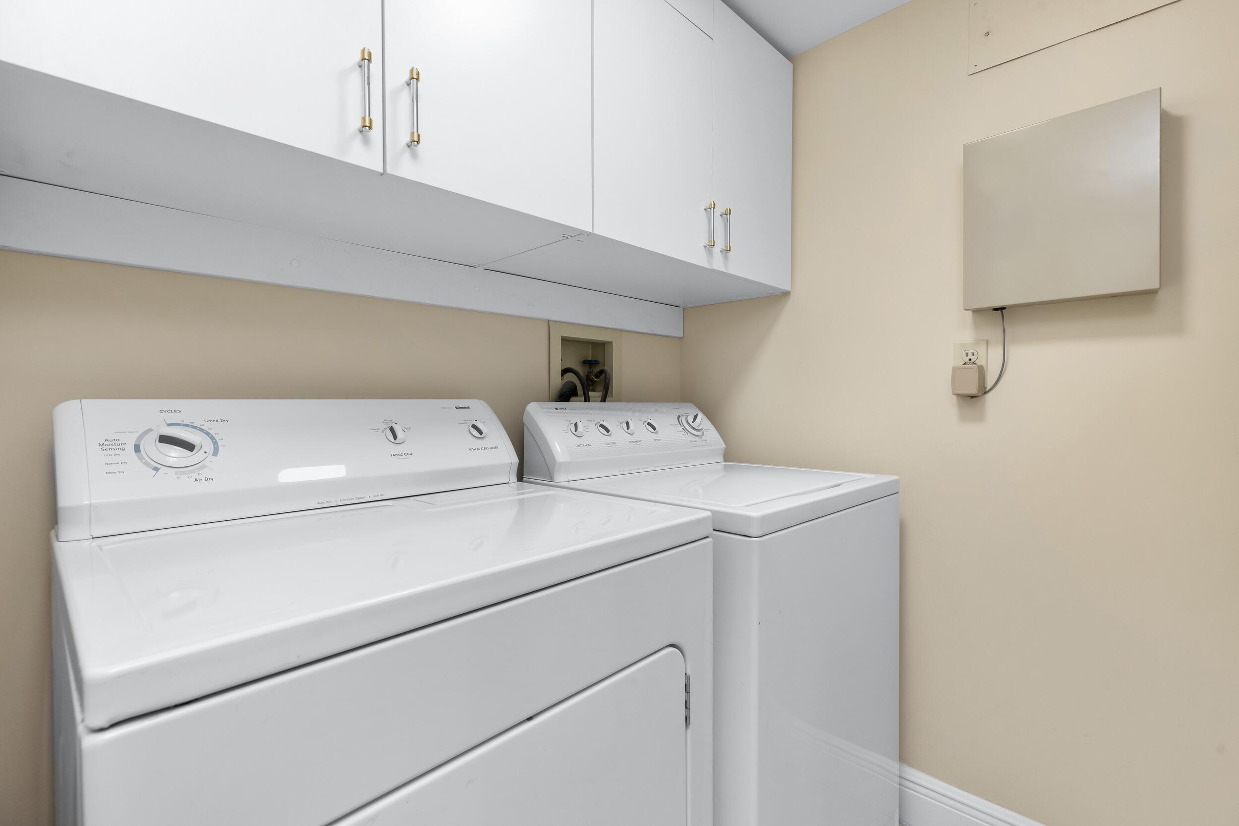 100 Southeast 5th Avenue, Unit 207 Boca Raton, FL 33432 - Photo 28 of 46 a utility room with dryer and washer