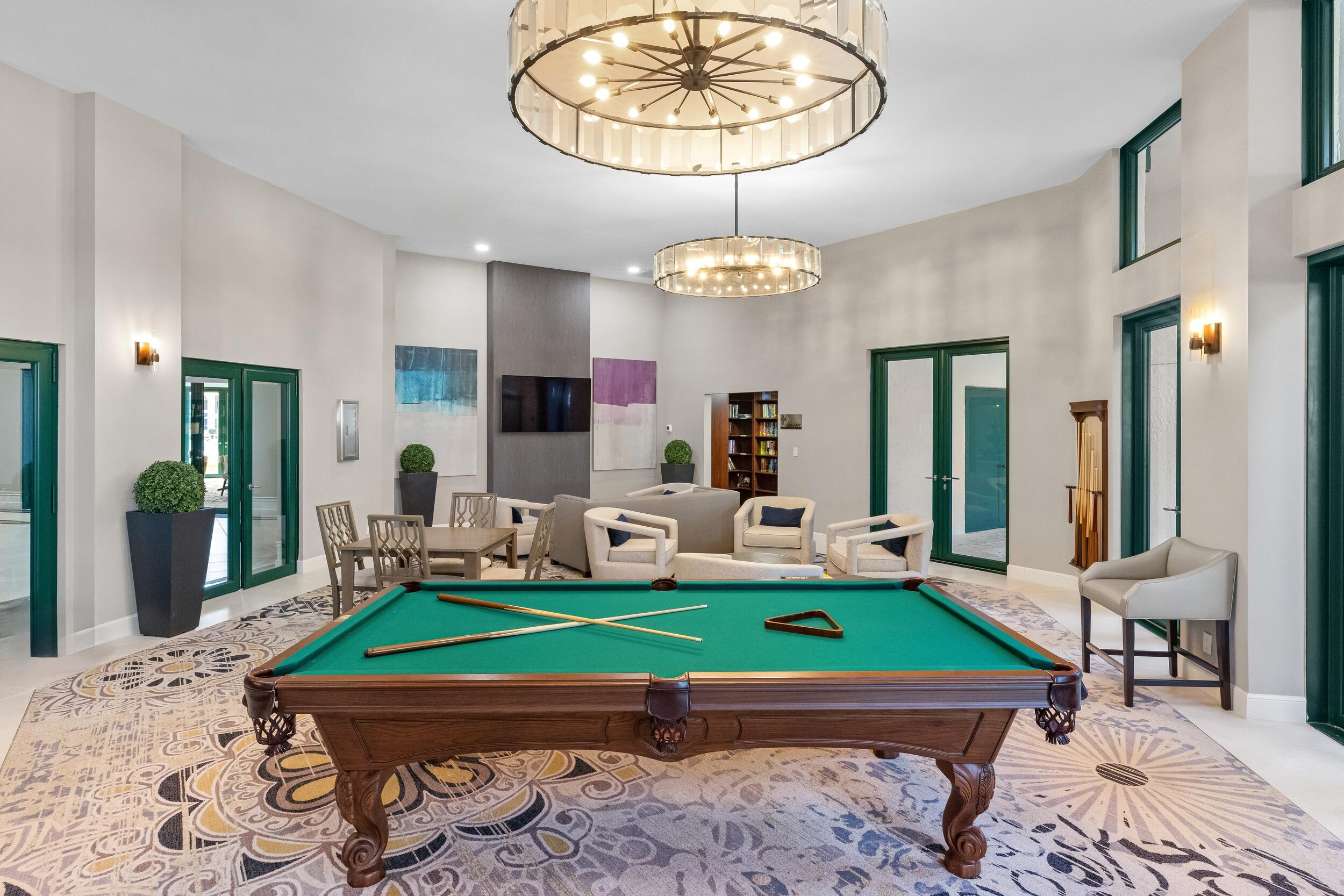 100 Southeast 5th Avenue, Unit 207 Boca Raton, FL 33432 - Photo 32 of 46 a room with pool table and windows