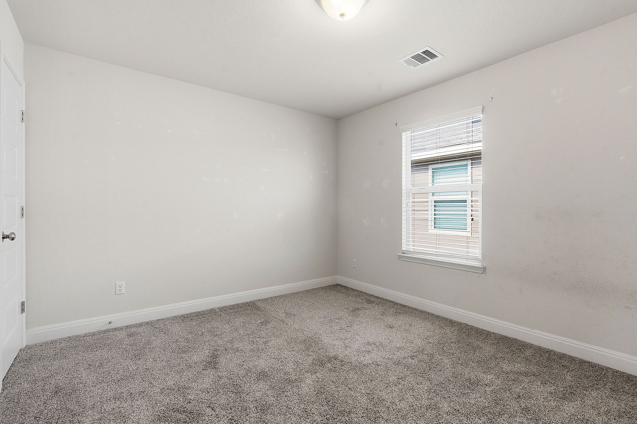 117 Methodius Drive Hutto, TX 78634 - Photo 24 of 40 Unfurnished room with carpet flooring and baseboards
