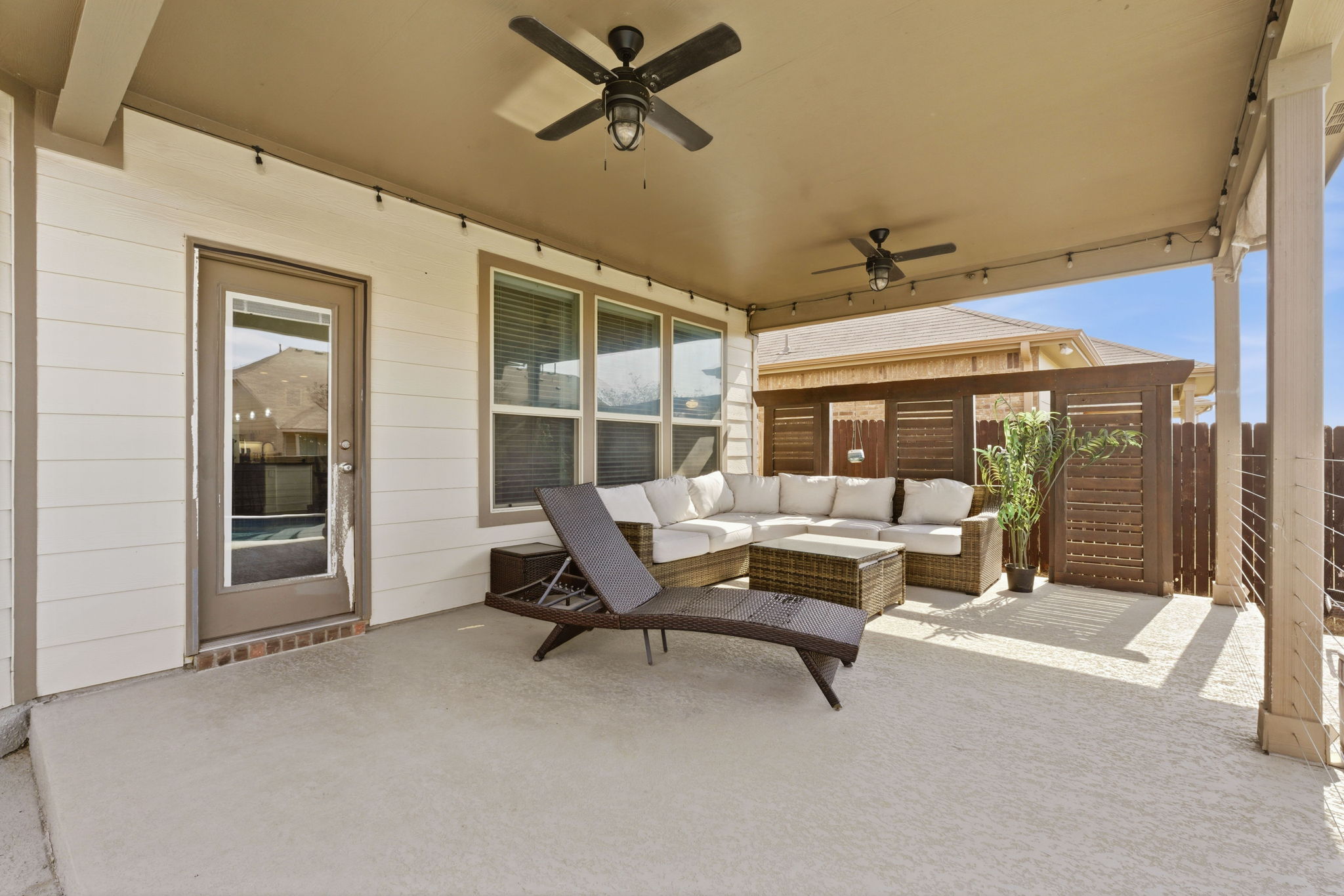 117 Methodius Drive Hutto, TX 78634 - Photo 29 of 40 View of patio with ceiling fan and outdoor seating