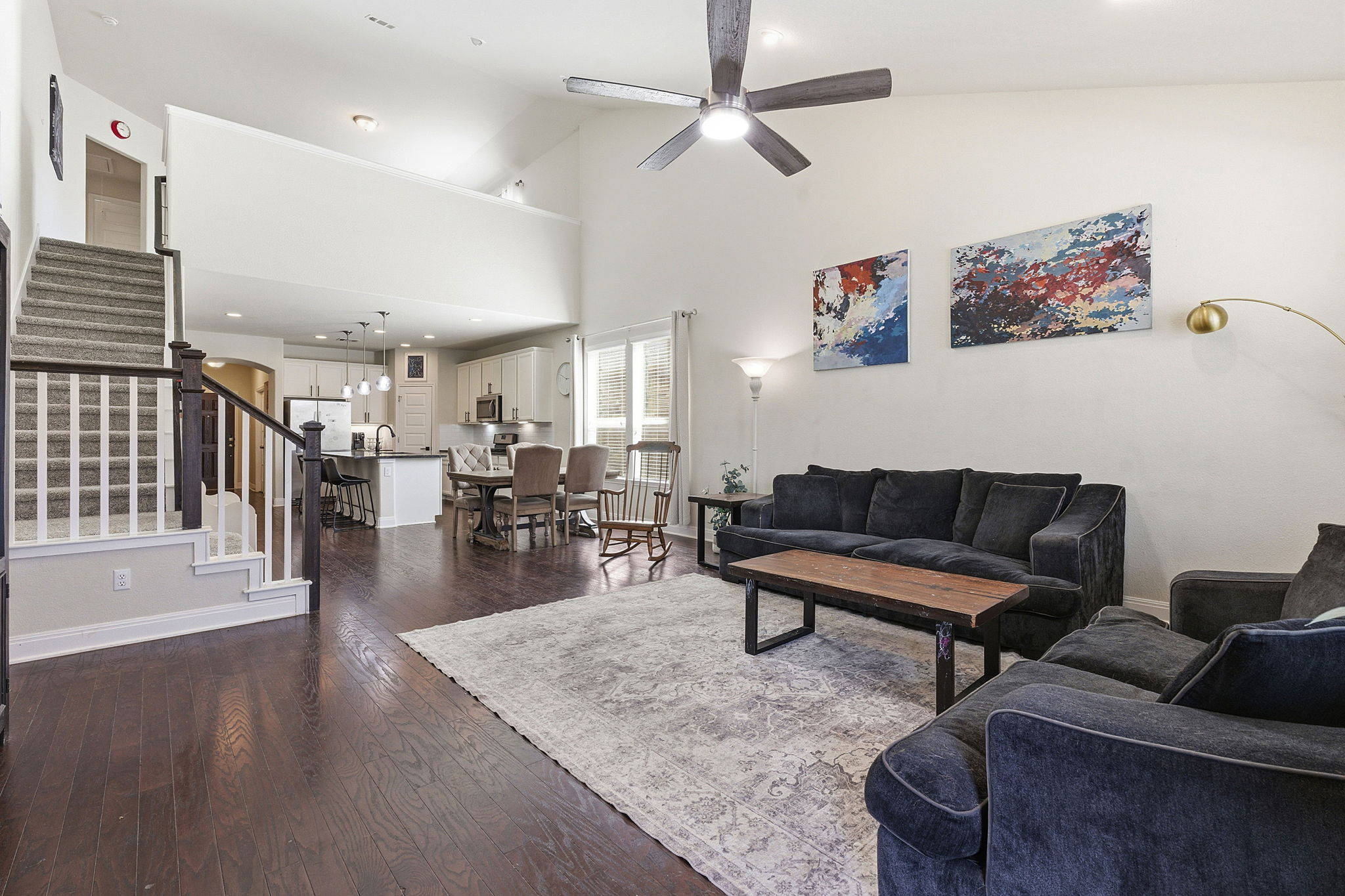 117 Methodius Drive Hutto, TX 78634 - Photo 5 of 40 Living area featuring dark wood-type flooring, a ceiling fan, recessed lighting, and lofted ceiling