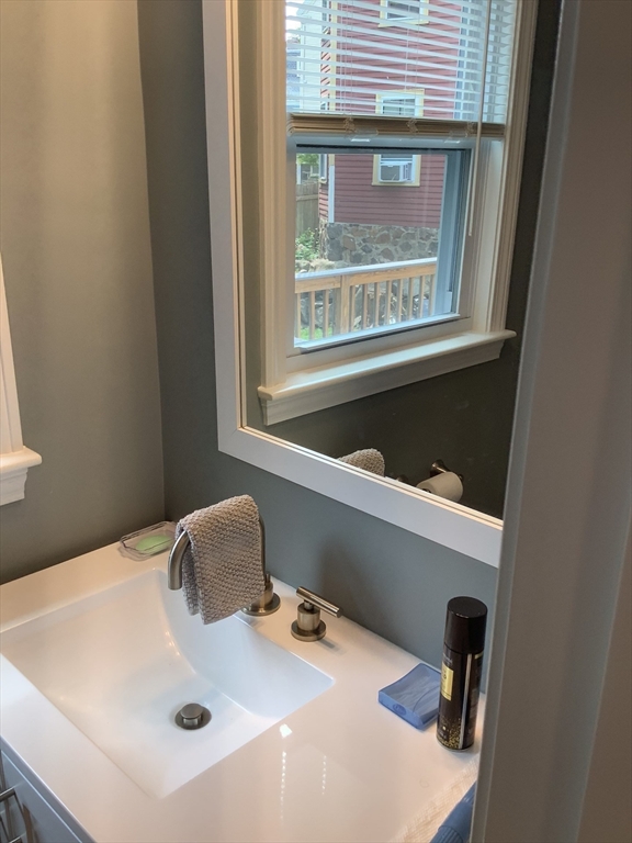 10 Moulton Court, Unit 10 Beverly, MA 01915 - Photo 13 of 21 a bathroom with a sink and a window
