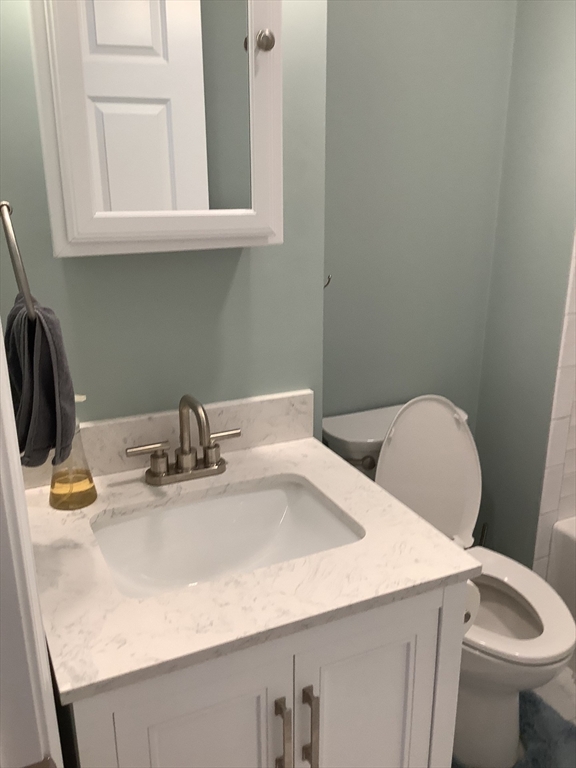 10 Moulton Court, Unit 10 Beverly, MA 01915 - Photo 7 of 21 a bathroom with a sink and a toilet