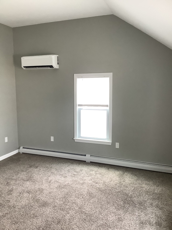 10 Moulton Court, Unit 10 Beverly, MA 01915 - Photo 9 of 21 an empty room with a window