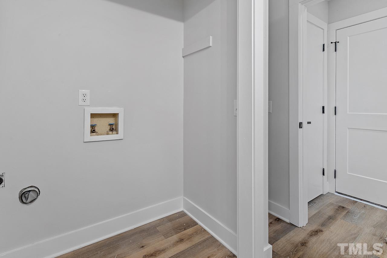 8205 Rocky Court Raleigh, NC 27616 - Photo 18 of 28 a view of a hallway with closet