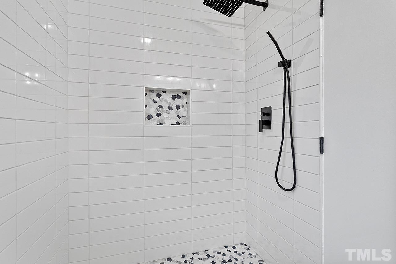 8205 Rocky Court Raleigh, NC 27616 - Photo 28 of 28 a bathroom with a shower