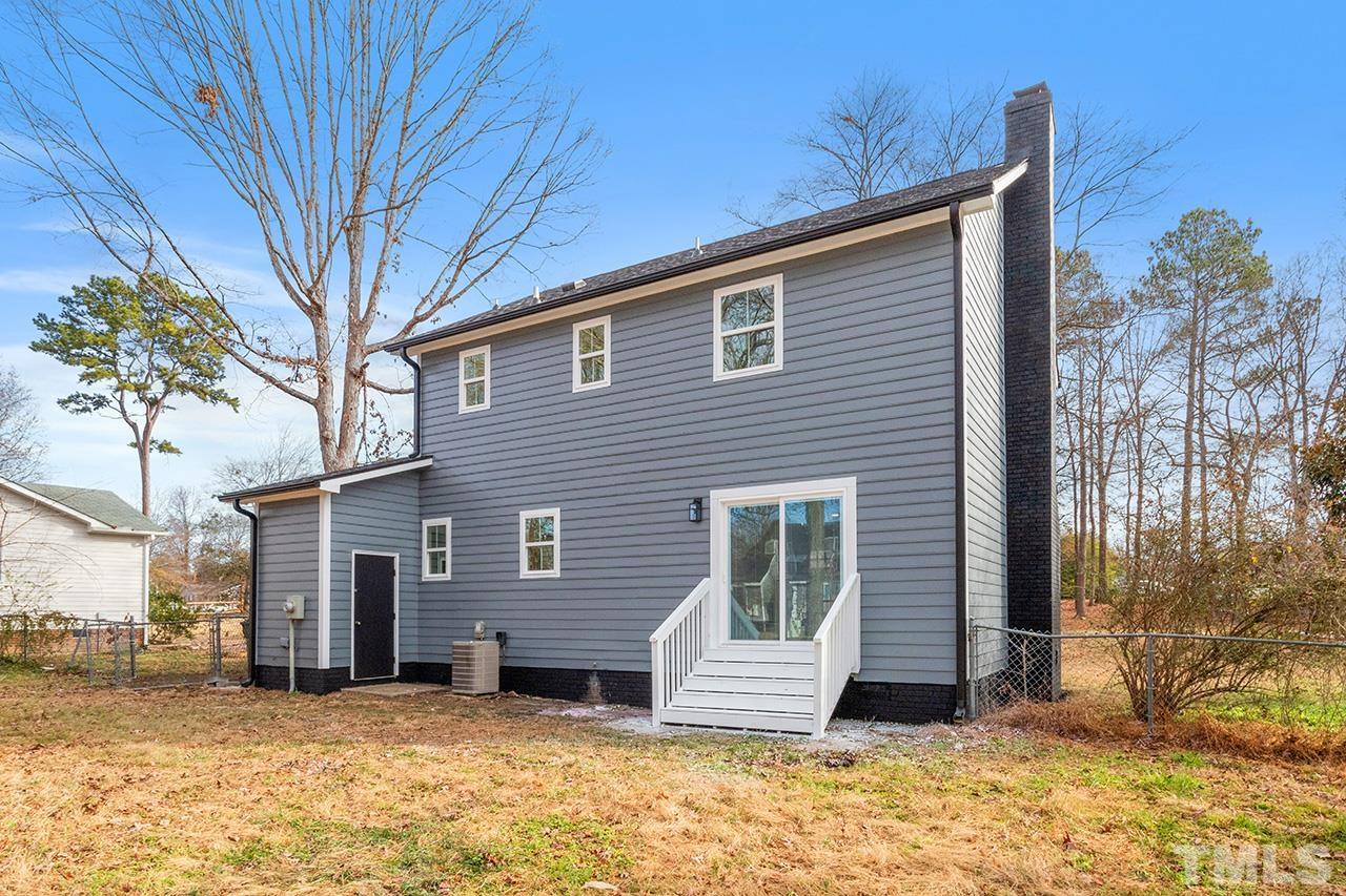 8205 Rocky Court Raleigh, NC 27616 - Photo 5 of 28 a view of a house with a yard