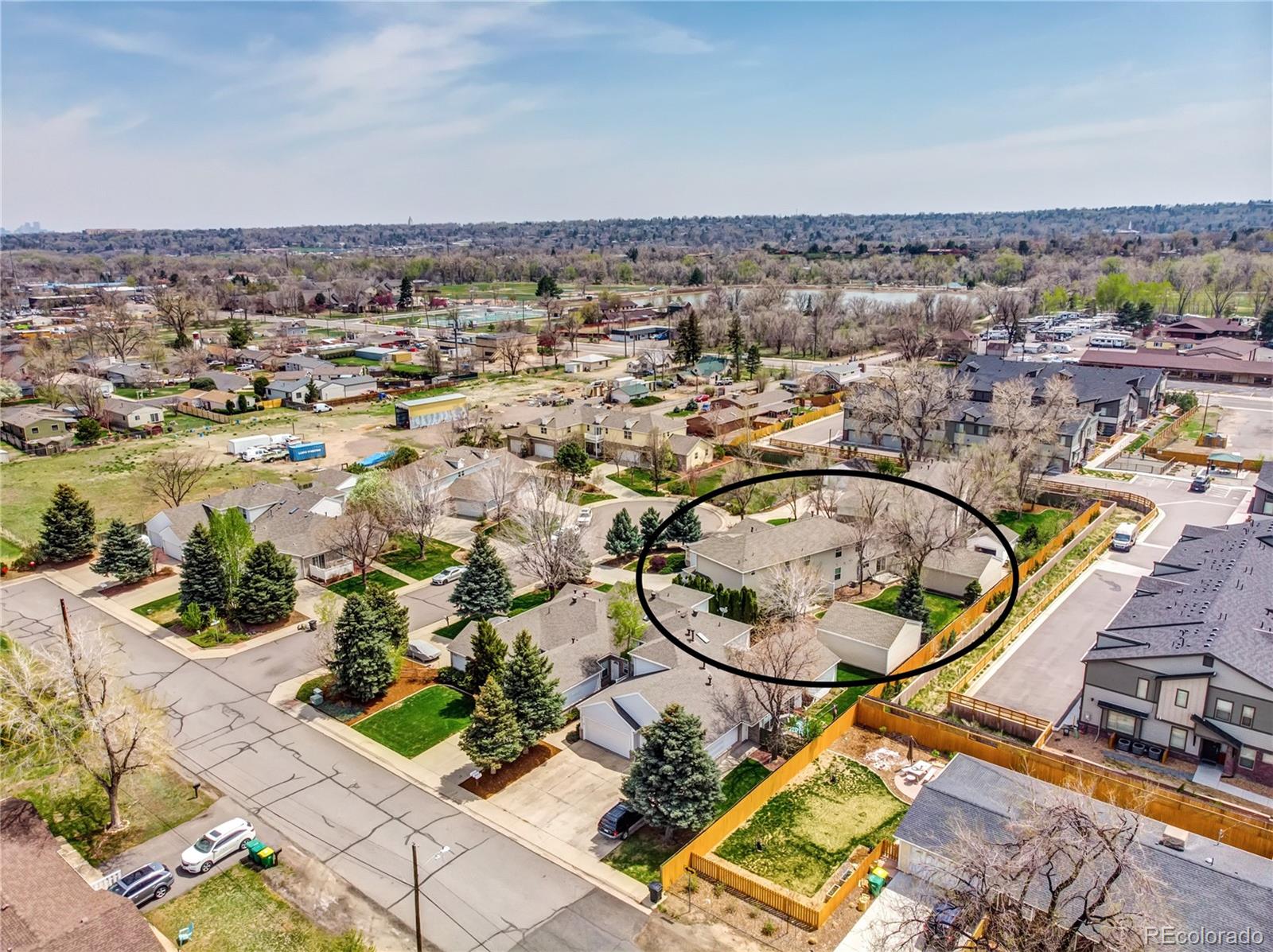 4545 Simms Court Wheat Ridge, CO 80033 - Photo 27 of 28 an aerial view of a residential building and lake view