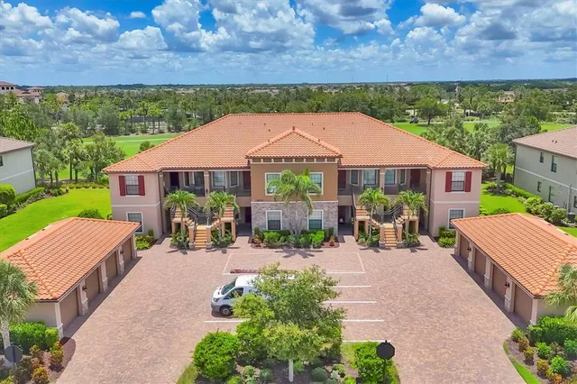 an outdoor space with furniture and garden view