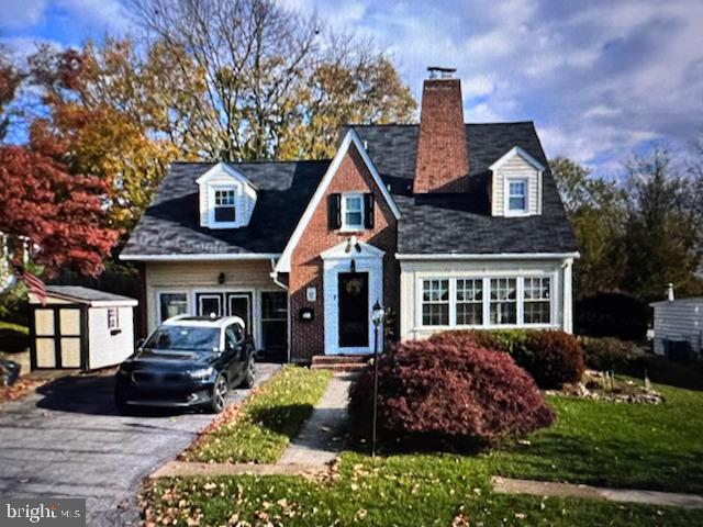 7 Hillside Road Claymont, DE 19703 - Photo 1 of 1 a front view of a house with garden