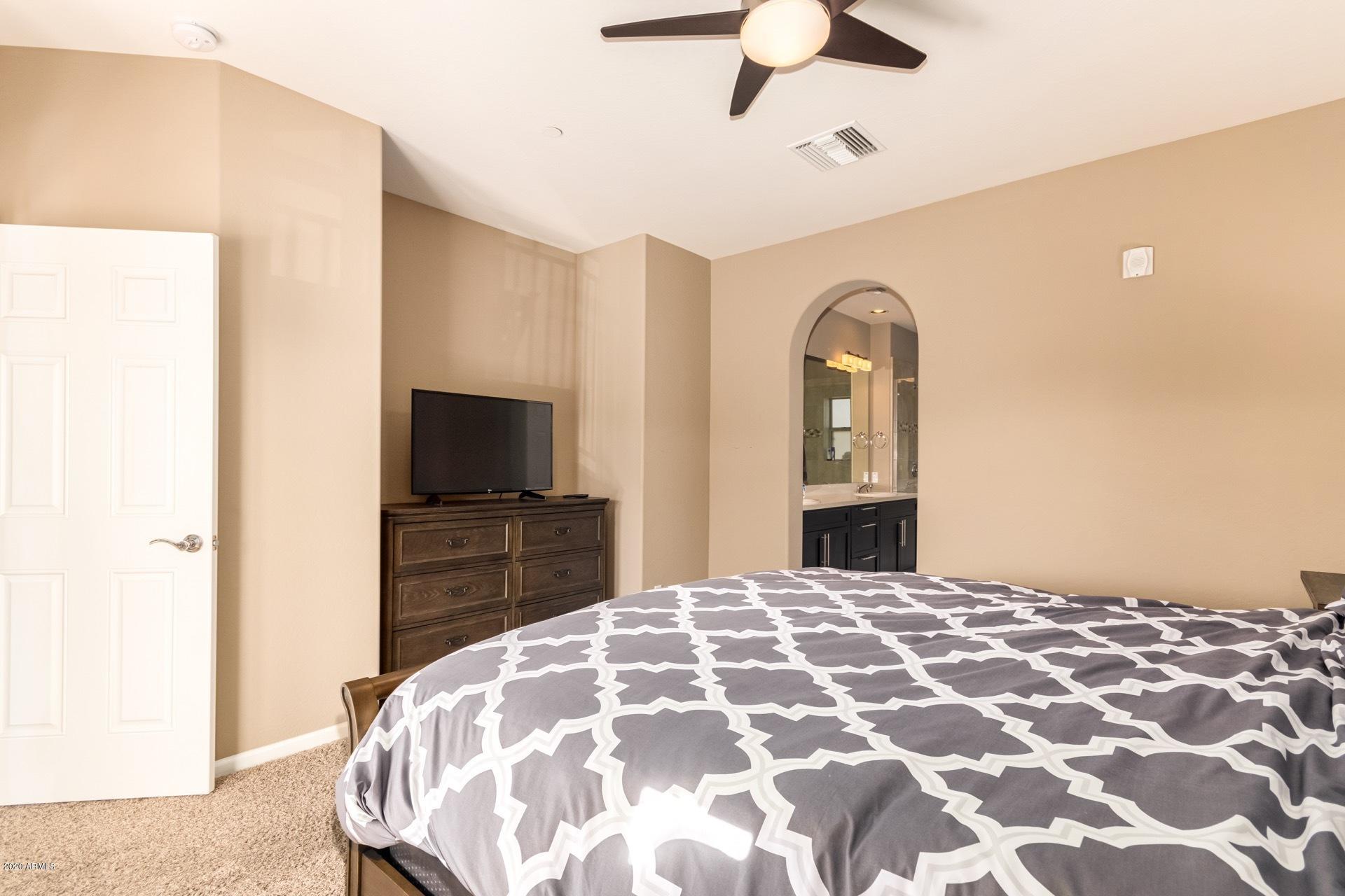 3935 East Rough Rider Road, Unit 1258 Phoenix, AZ 85050 - Photo 15 of 32 Main Bedroom