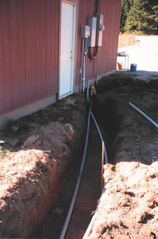 a view of a backyard of the house