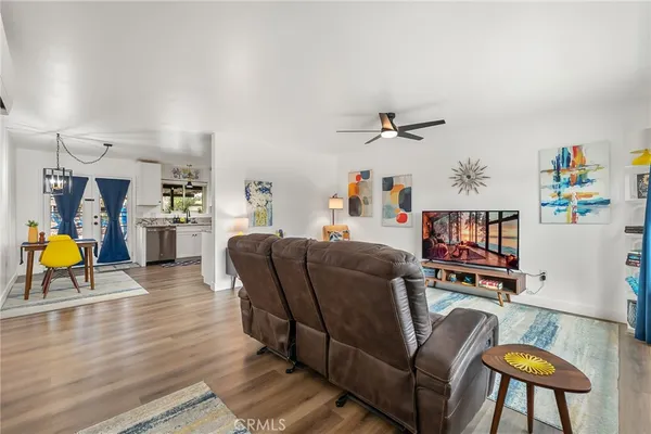 a living room with furniture and a table