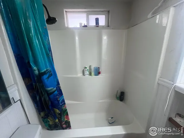 a bathroom with a bathtub