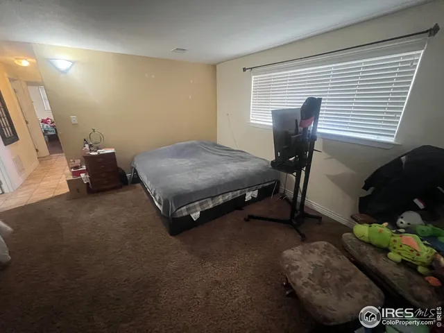 a room with furniture and a window