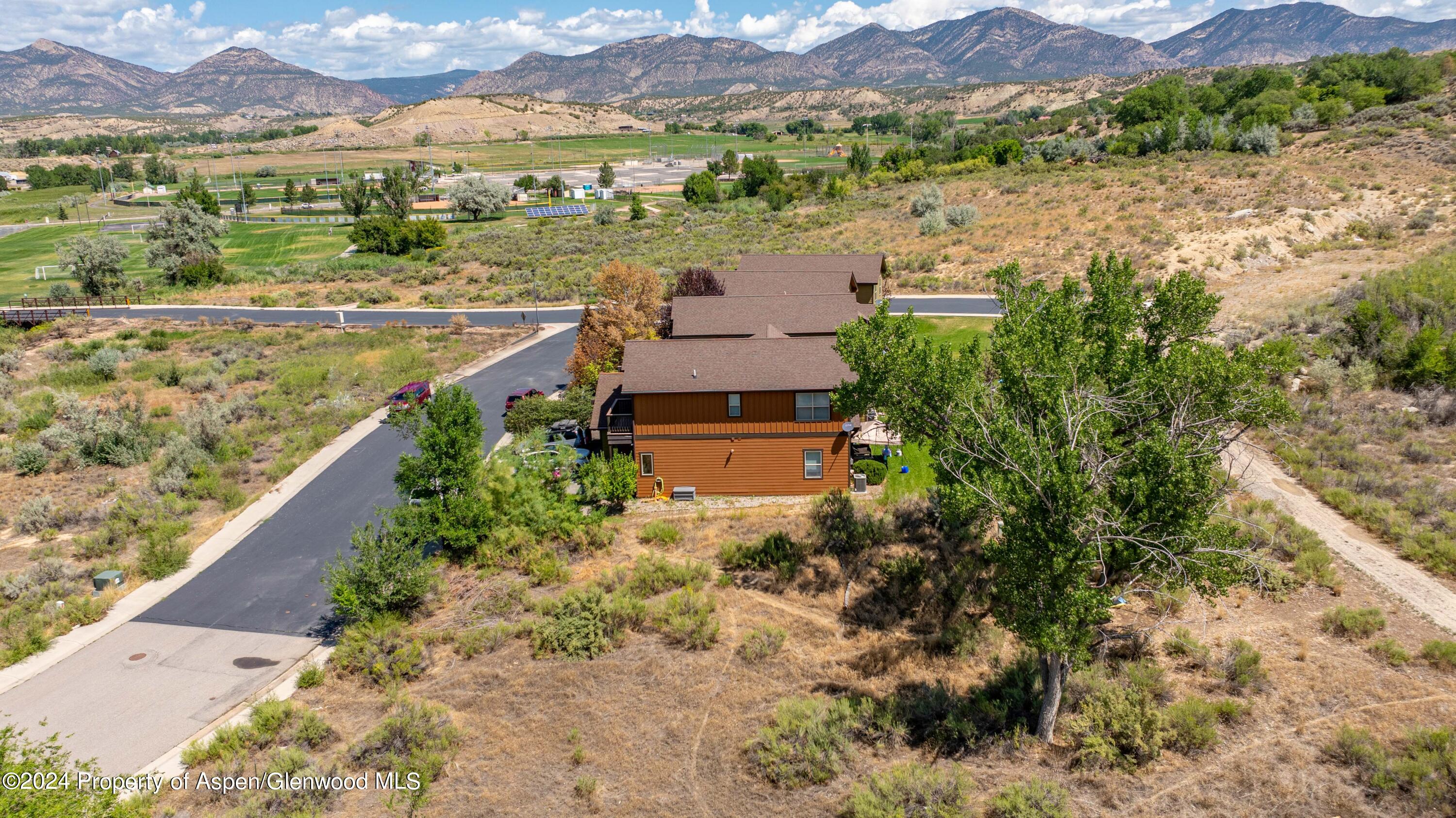 Rifle Proper Rifle, CO 81650 - Photo 3 of 23 an aerial view of house with yard and ocean view