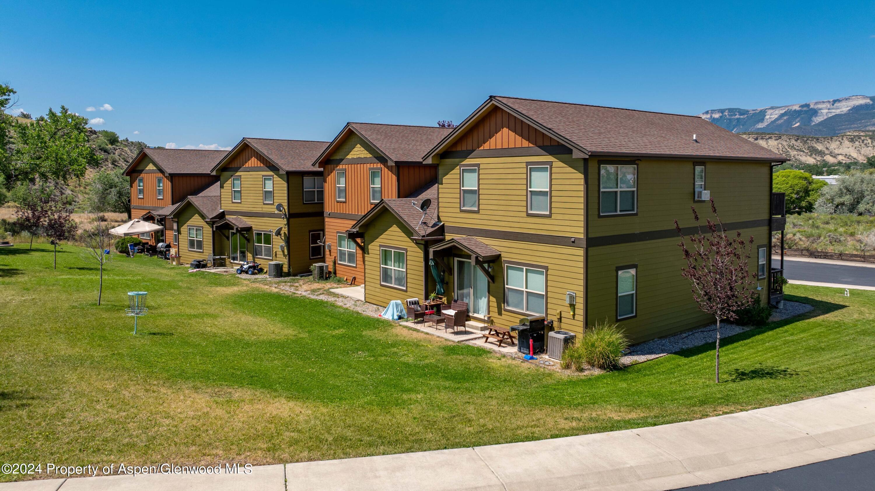 Rifle Proper Rifle, CO 81650 - Photo 5 of 23 a front view of house with yard and green space