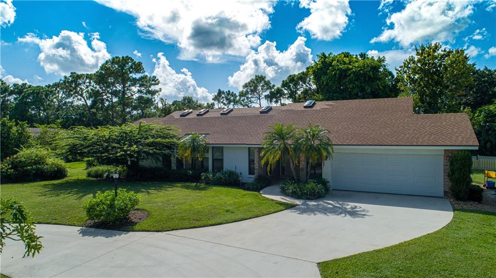 6476 Wood Lake Road Jupiter, FL 33458 - Photo 2 of 32 Exterior Front