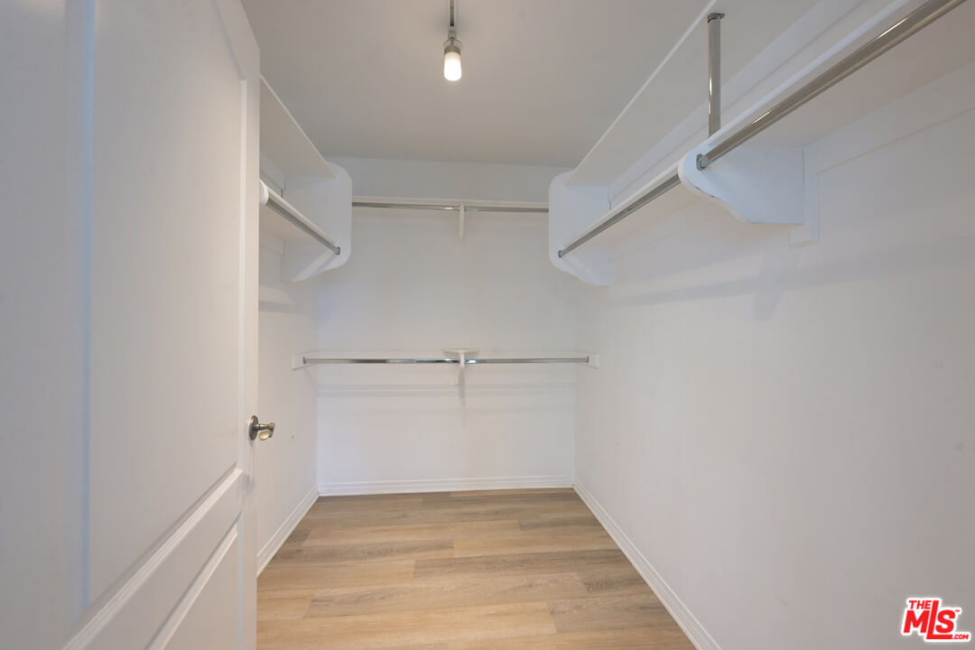 8555 Cashio Street, Unit PH4 Los Angeles, CA 90035 - Photo 16 of 43 a view of an empty walk in closet