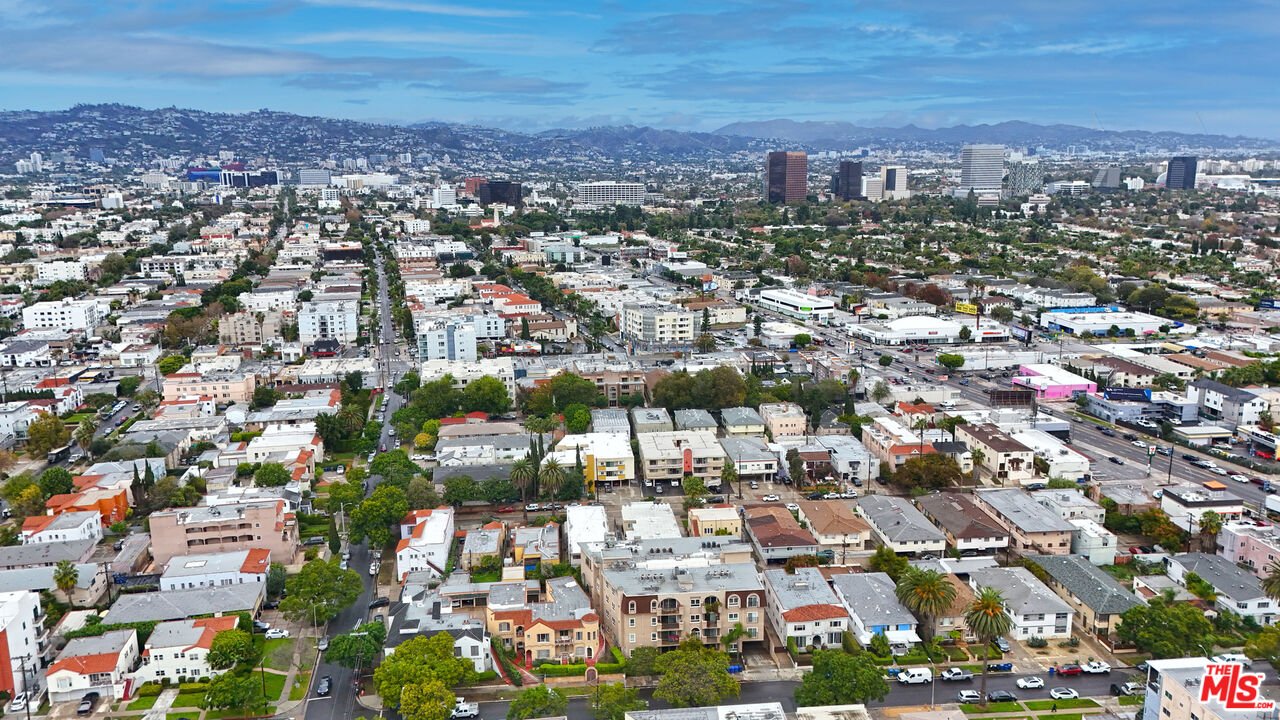 8555 Cashio Street, Unit PH4 Los Angeles, CA 90035 - Photo 39 of 43 an aerial view of residential houses with city view