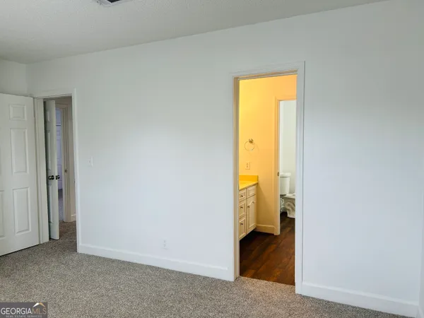 a view of street with parked cars