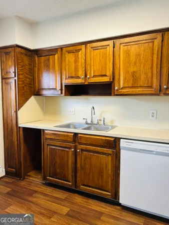 a kitchen with a stove and a microwave