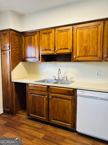 a kitchen with a stove and a microwave