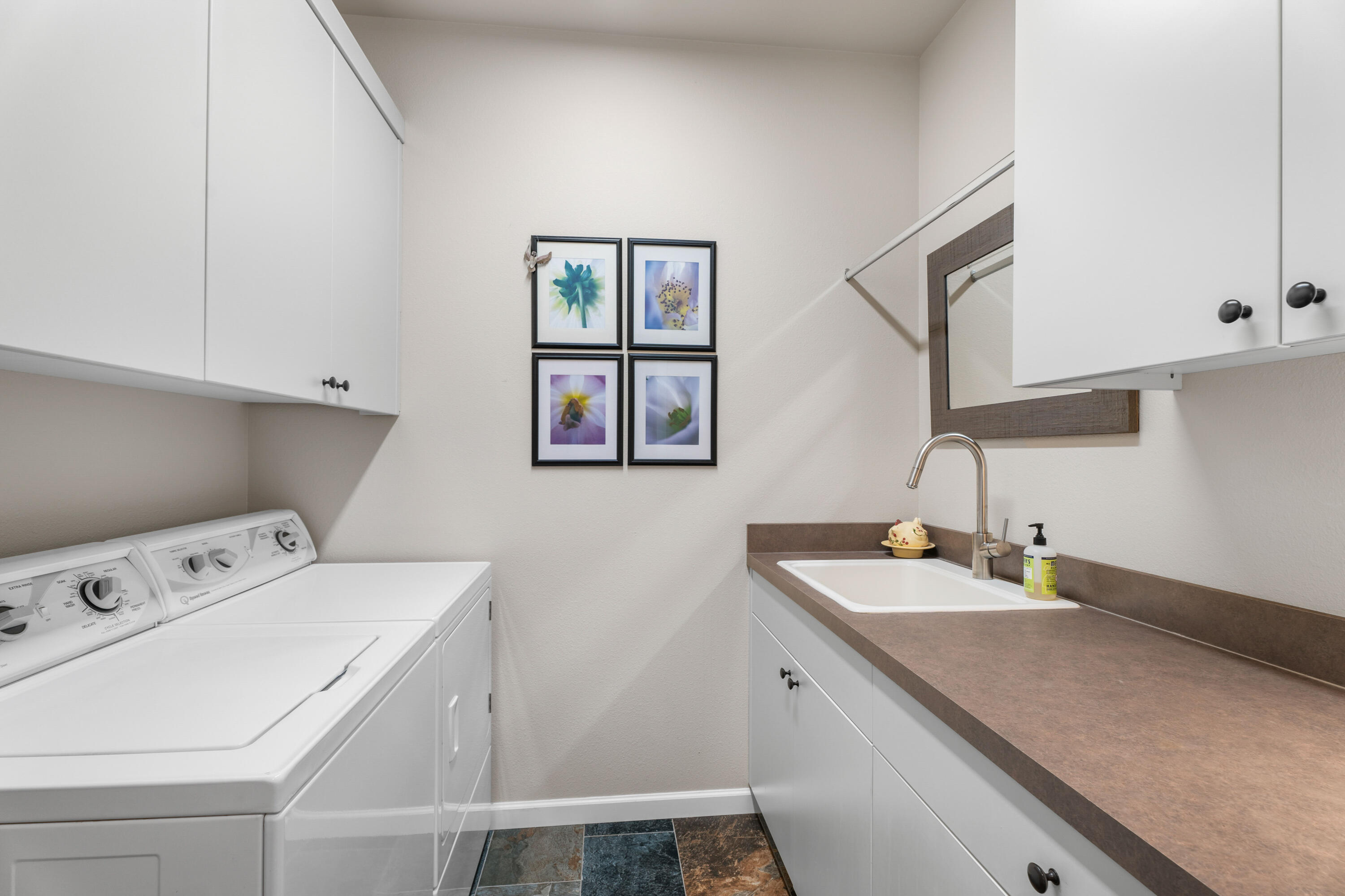 205 Vista Rim Drive Redmond, OR 97756 - Photo 17 of 85 a utility room with two washing machine