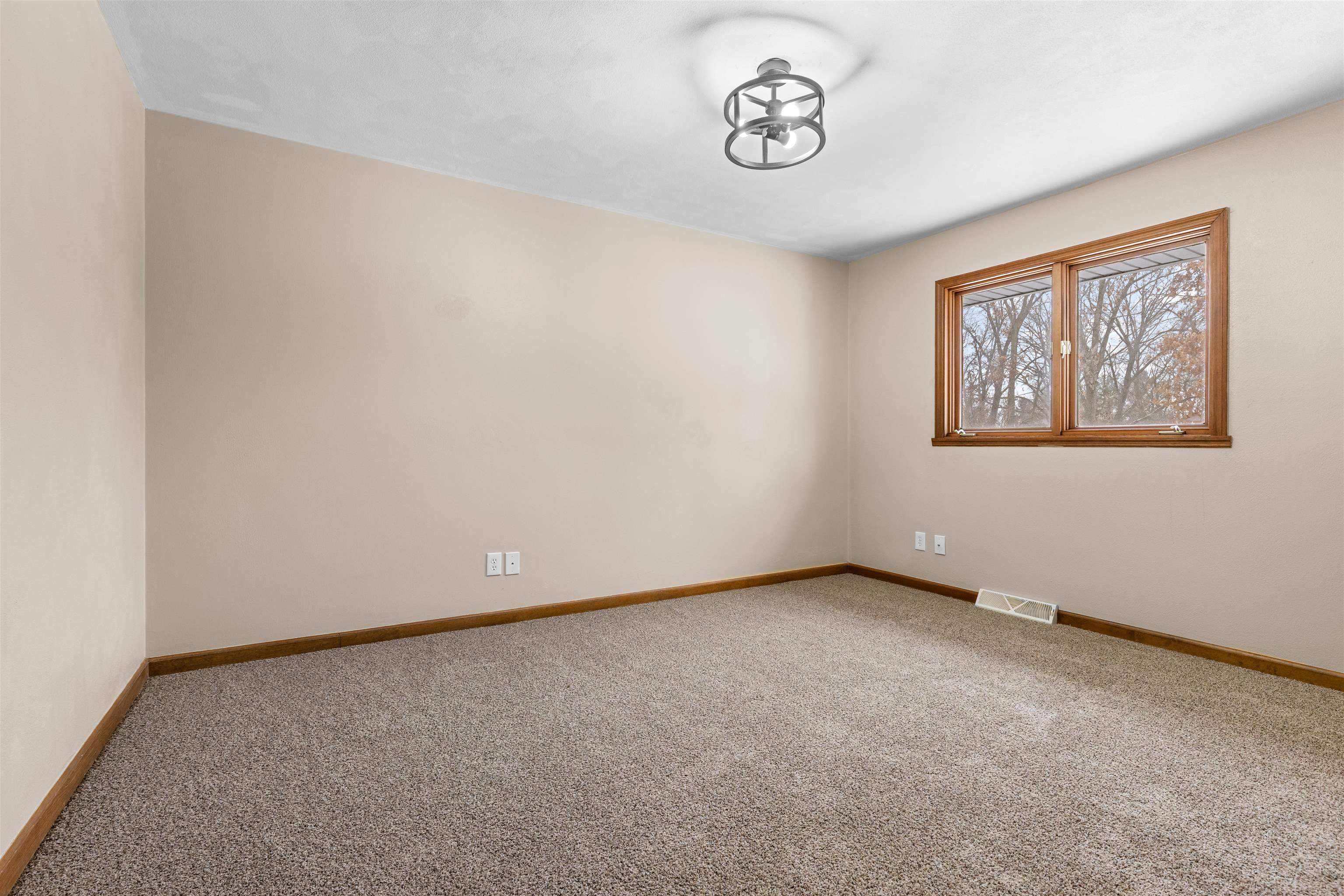 11738 Southgate Road Roscoe, IL 61073 - Photo 15 of 27 a view of an empty room with a window