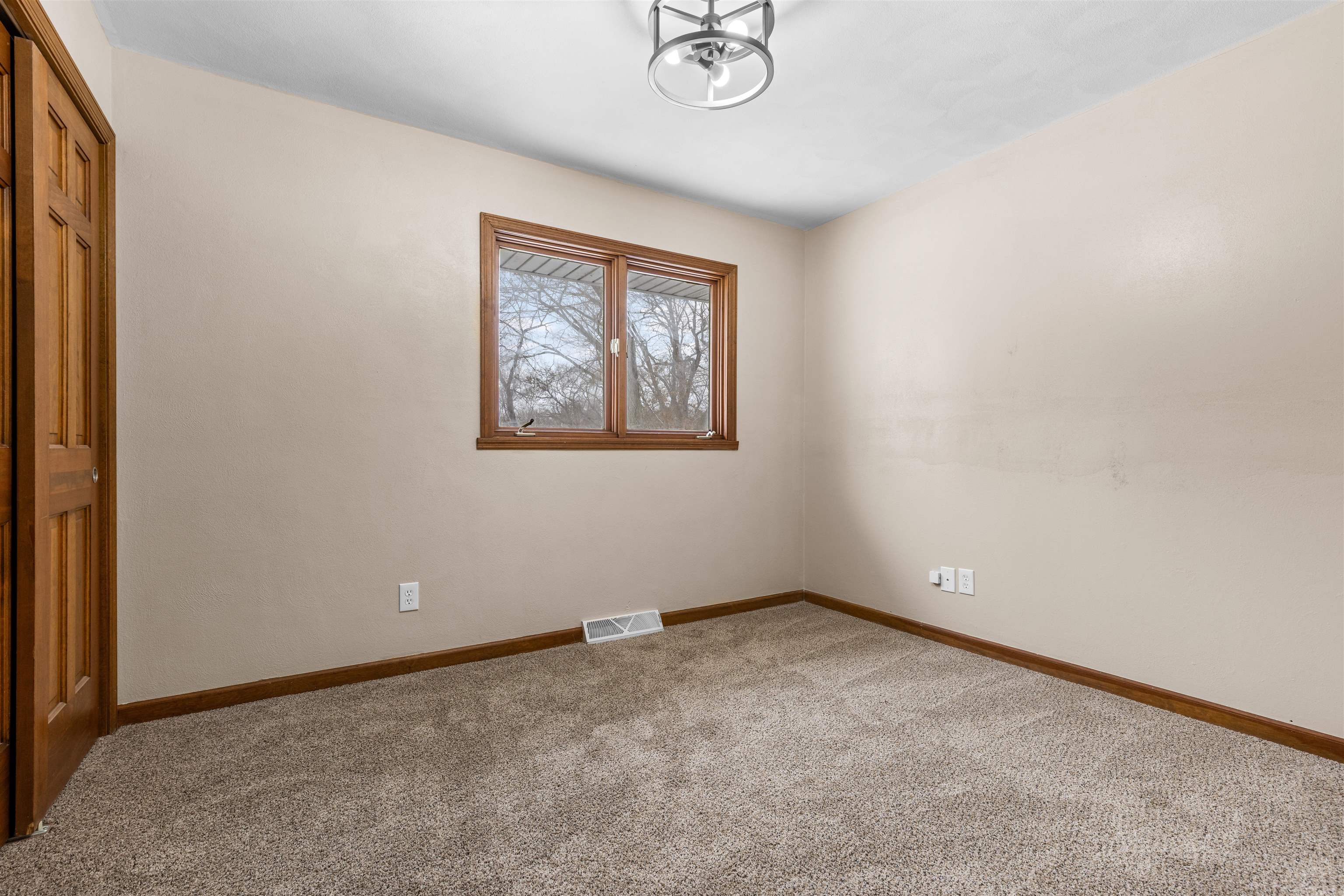 11738 Southgate Road Roscoe, IL 61073 - Photo 16 of 27 a view of an empty room with a window