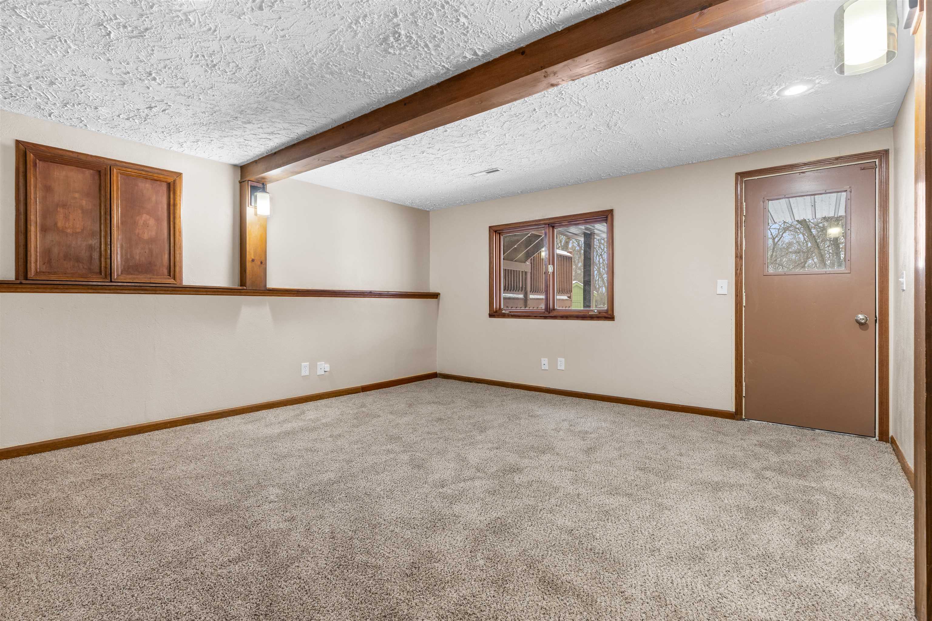 11738 Southgate Road Roscoe, IL 61073 - Photo 2 of 27 an empty room with windows