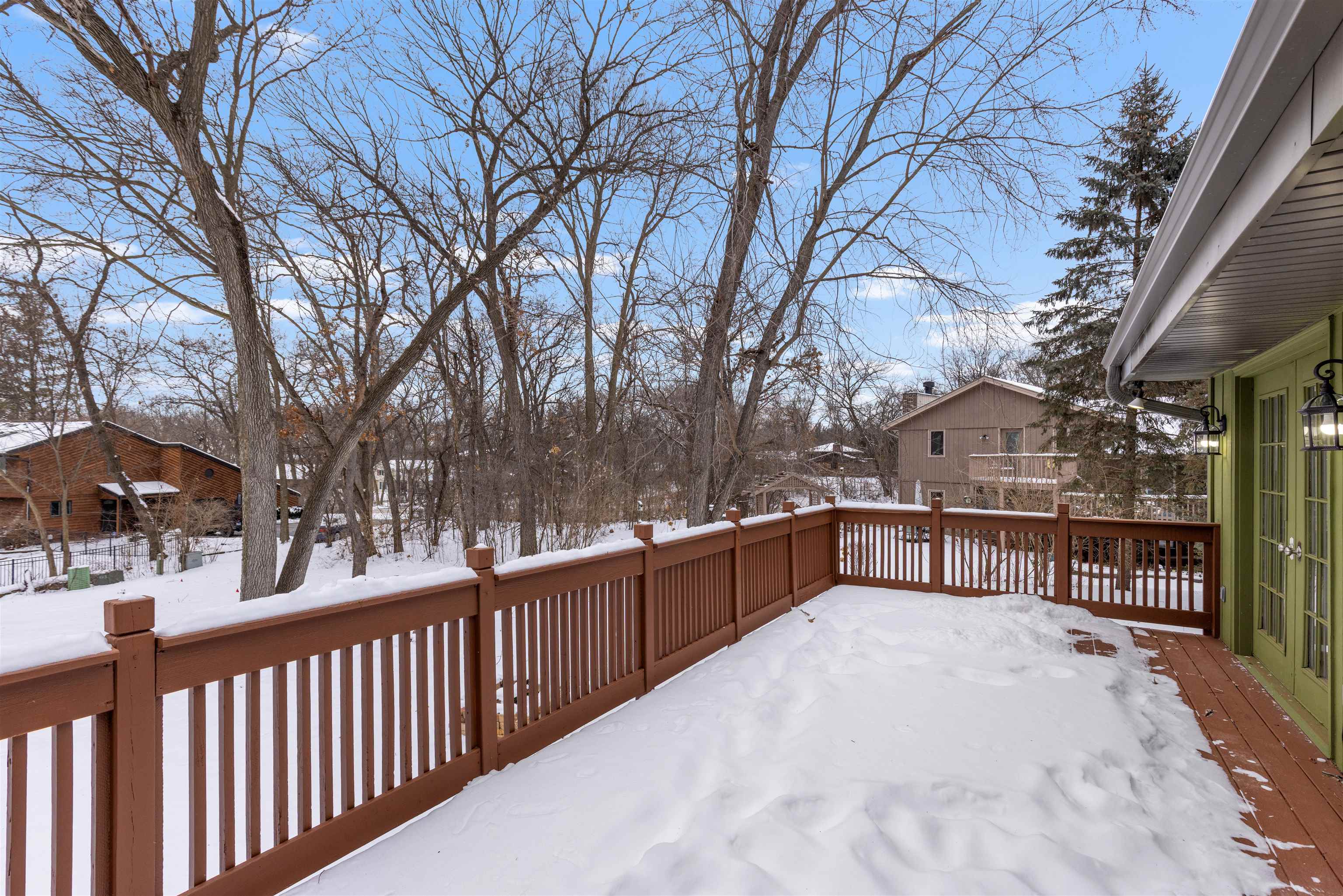 11738 Southgate Road Roscoe, IL 61073 - Photo 6 of 27 a view of a house with a wooden fence