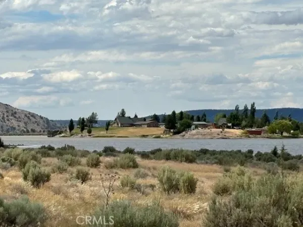a view of mountain view with large tree