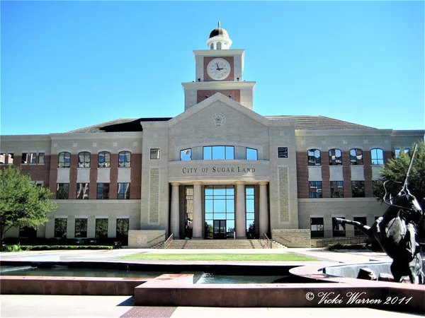 a front view of a building with street view