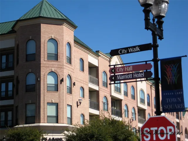 a front view of a multi story residential apartment building