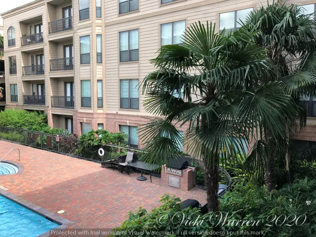 a view of a building and a yard