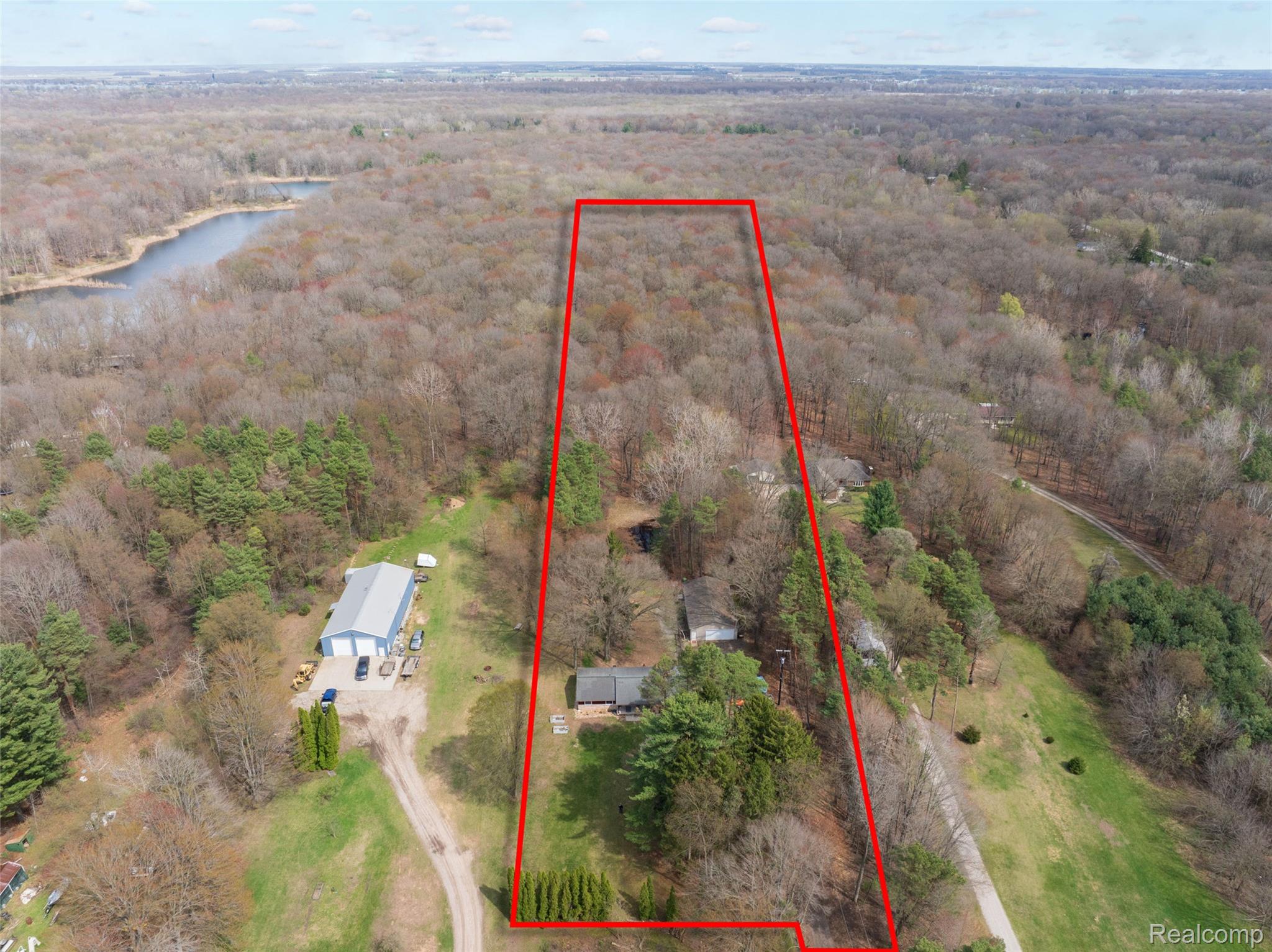 8639 Stone Road Algonac, MI 48001 - Photo 3 of 31 Aerial view of property and surrounding area featuring property boundaries highlighted and a large body of water