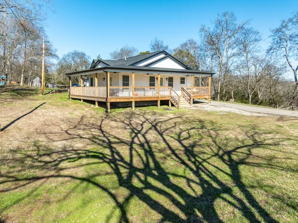 a house with yard in front of it