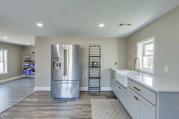 a view of kitchen and front door