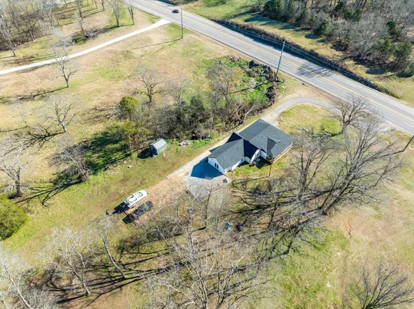 a house with trees in front of it