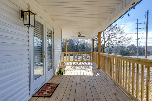 a view of kitchen with furniture and wooden floor