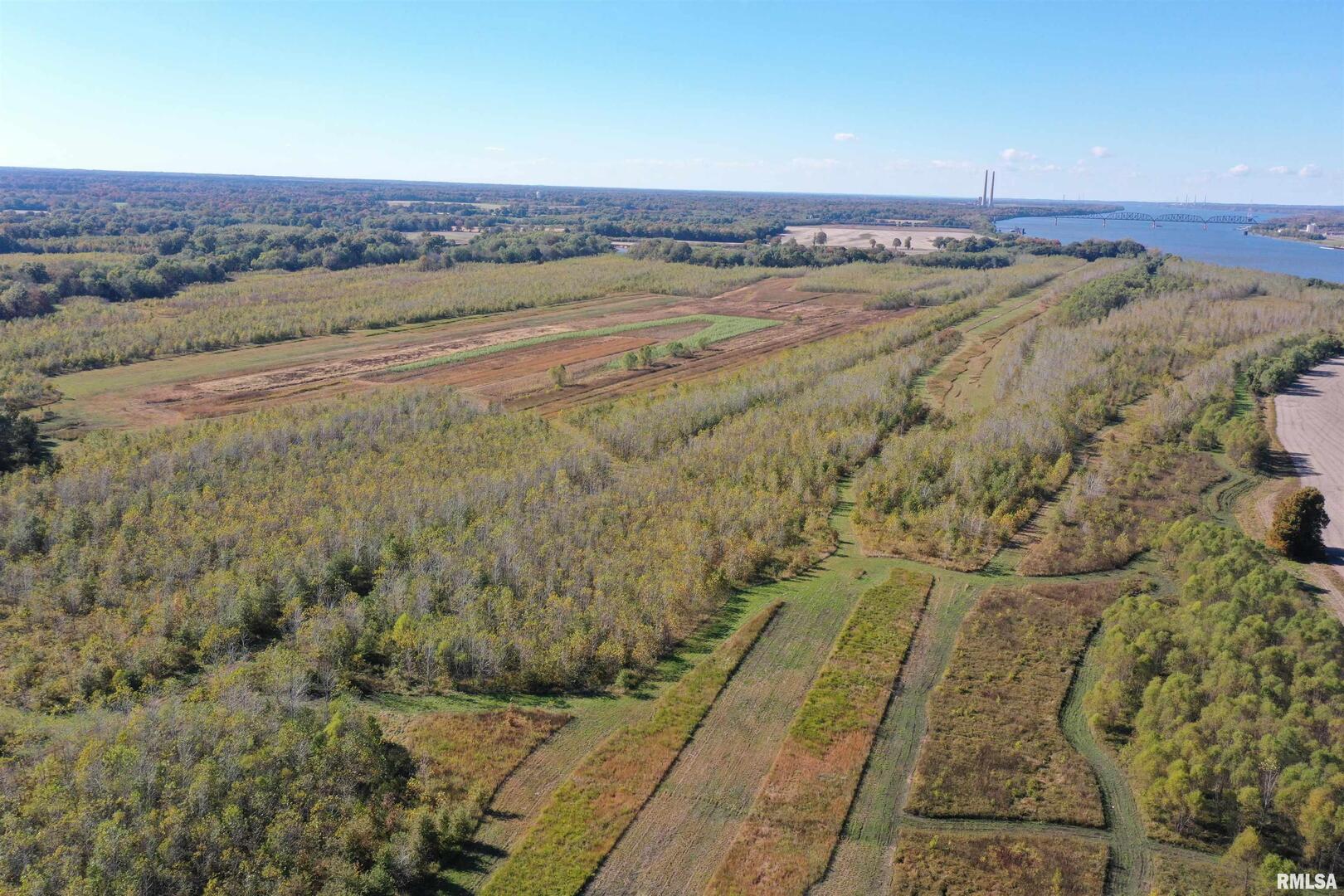 5465 Noble Road Paducah, KY 42001 - Photo 32 of 60 a view of an ocean beach and mountain