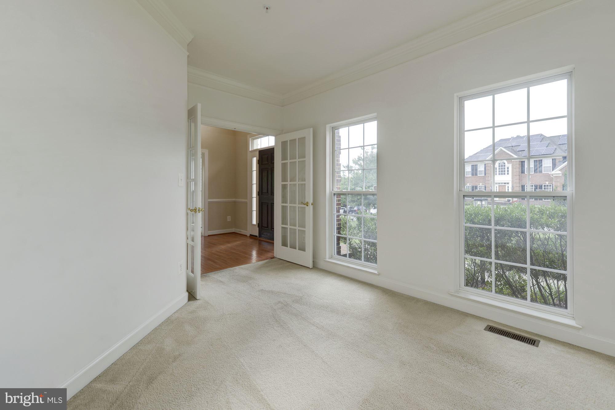 407 Potomac Ridge Drive Fort Washington, MD 20744 - Photo 12 of 30 an empty room with windows and entrance