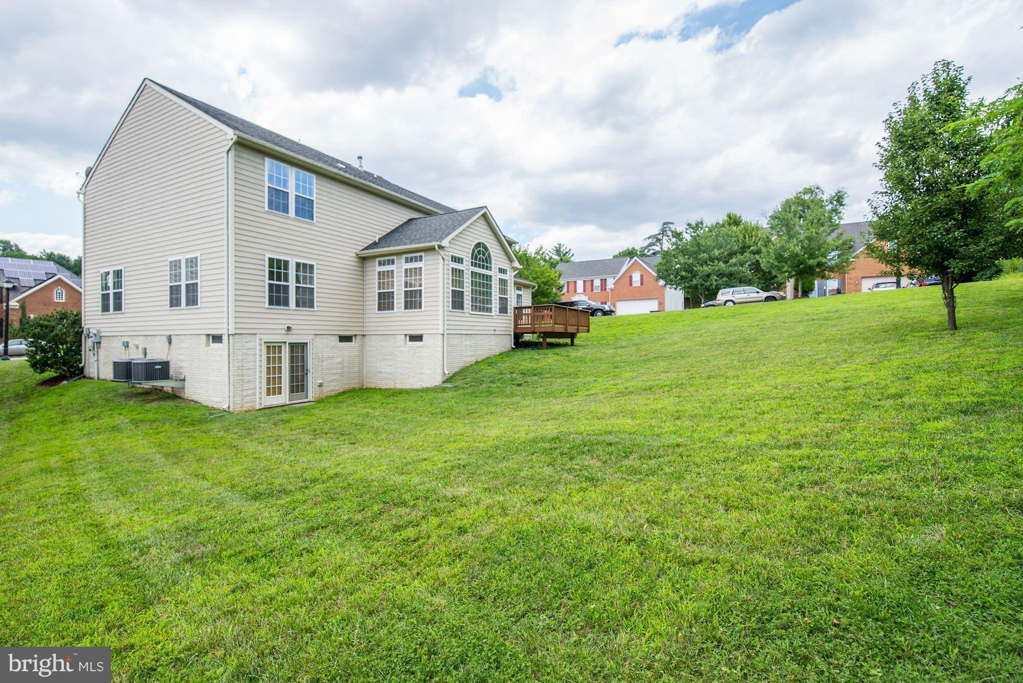 407 Potomac Ridge Drive Fort Washington, MD 20744 - Photo 26 of 30 a view of a house with backyard