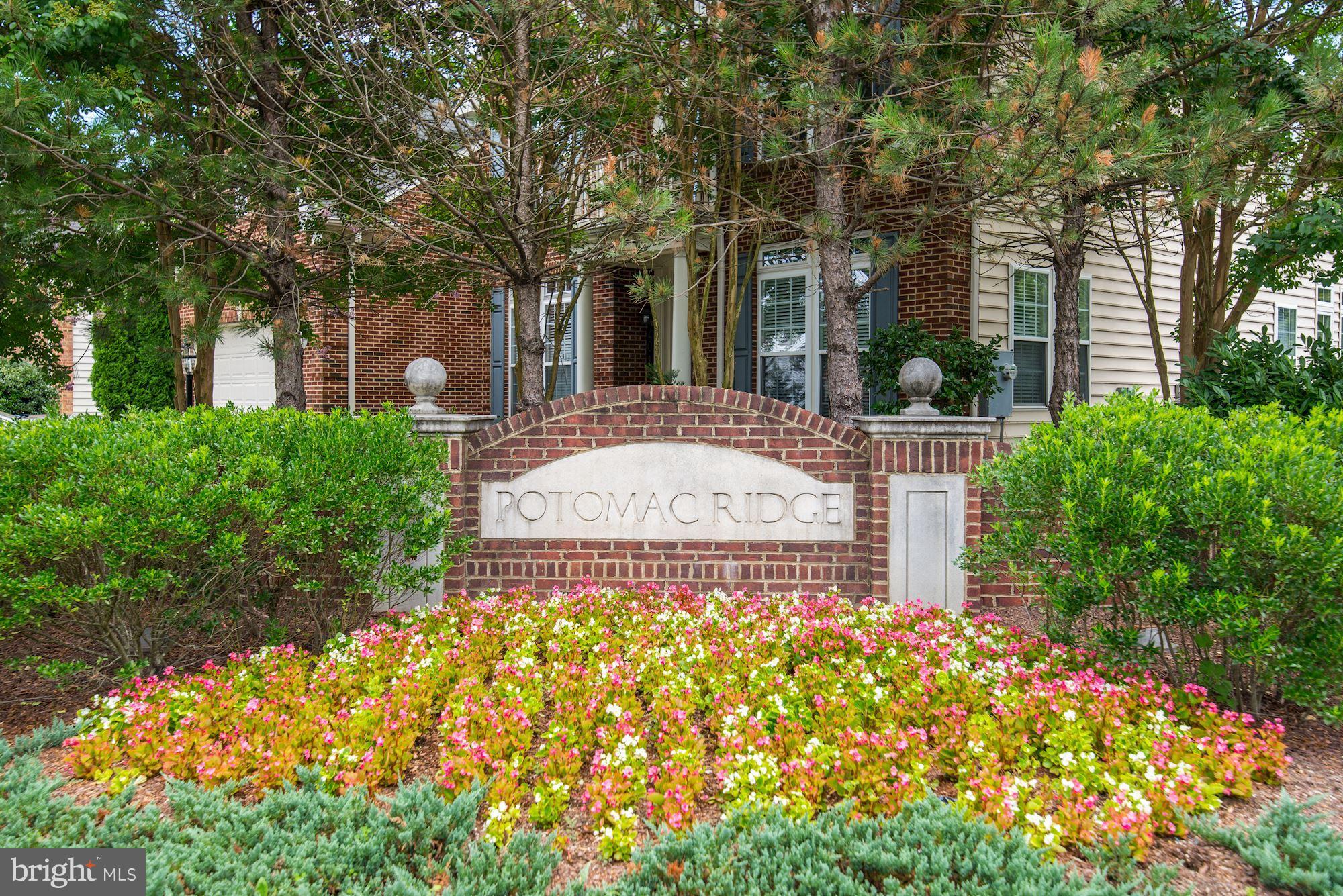 407 Potomac Ridge Drive Fort Washington, MD 20744 - Photo 29 of 30 front view of a house with a garden