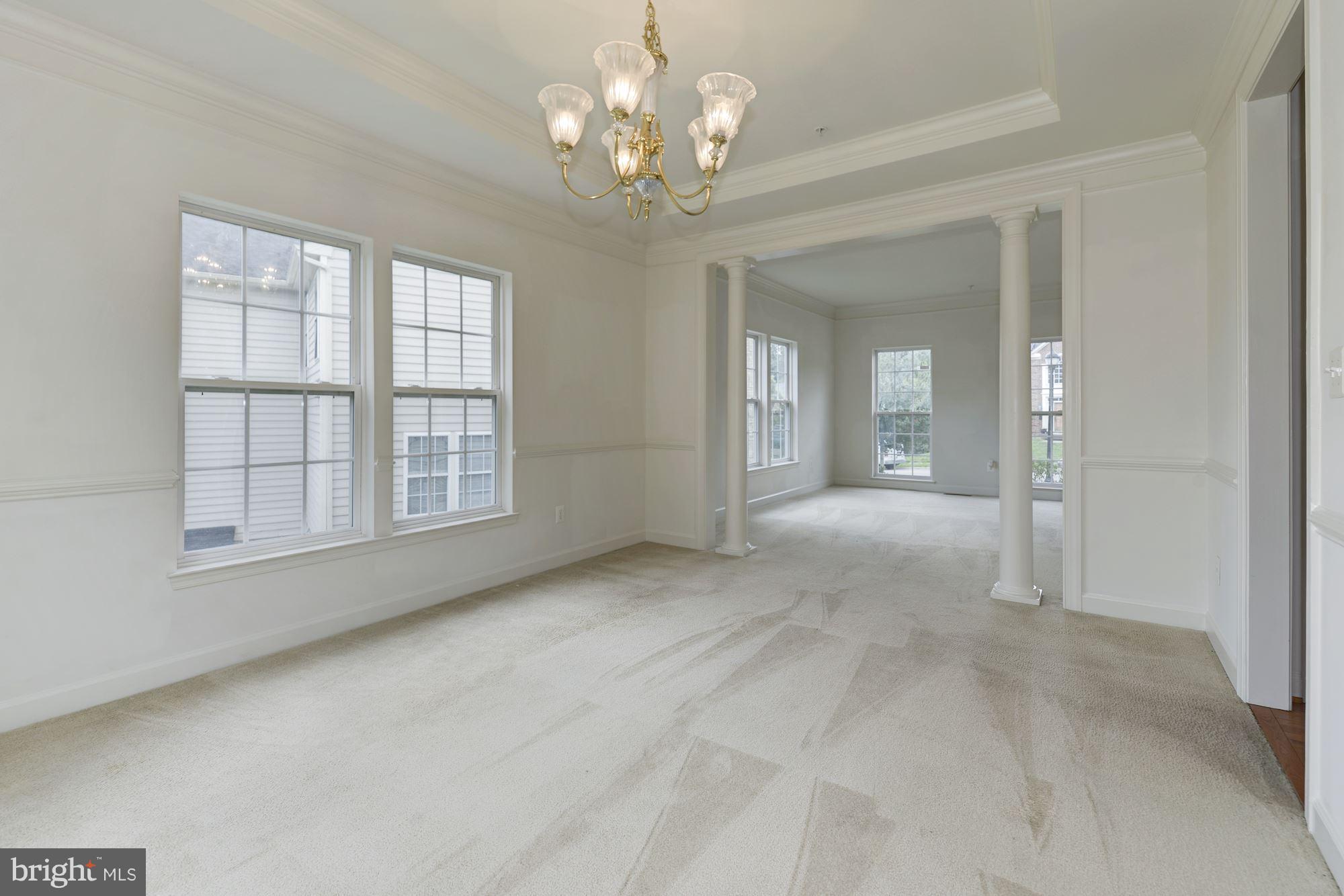 407 Potomac Ridge Drive Fort Washington, MD 20744 - Photo 10 of 30 wooden floor in an empty room with a window