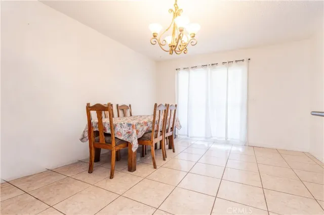a kitchen with stainless steel appliances granite countertop a stove top oven