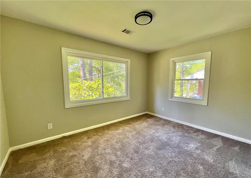3706 Larkspur Terrace Decatur, GA 30032 - Photo 5 of 10 a view of an empty room with a window