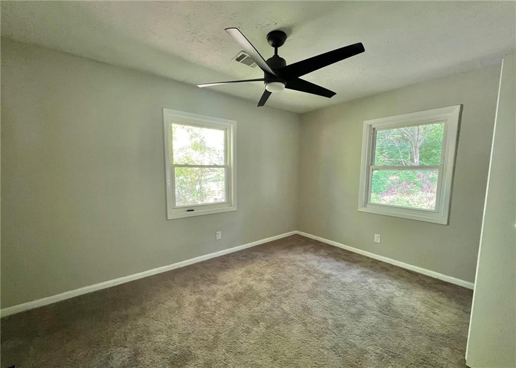 3706 Larkspur Terrace Decatur, GA 30032 - Photo 7 of 10 a view of an empty room with a window